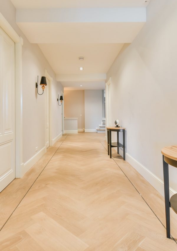 Long stunning hallway with wood flooring in East Lothian